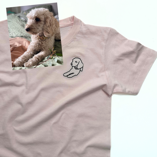 Elevate your child's wardrobe with our personalized pet embroidery service. Simply upload a photo of your child's favorite furry friend and we will transform it into a unique, custom design embroidered onto a t-shirt. With vibrant colors and intricate stitching, this one-of-a-kind piece will showcase your child's love for their pet and make a perfect addition to their wardrobe.