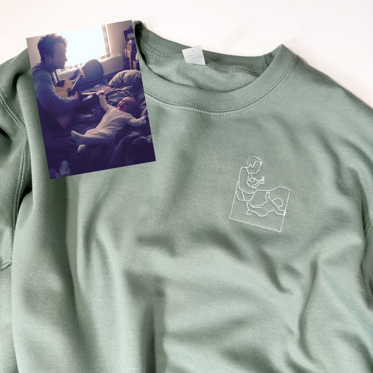 Embroidered sweater featuring custom outline artwork converted from a customer-submitted picture. Intricately stitched design adds a unique and personalized touch to this cozy and stylish garment. The sweater showcases exquisite craftsmanship and attention to detail with the perfect embroidery, creating a one-of-a-kind piece of wearable art.