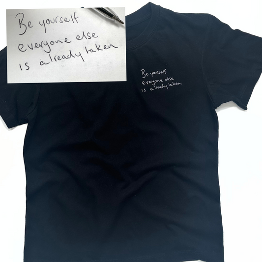 Create a unique and memorable t-shirt for your child with their very own handwritten message. Simply upload a photo of the note and we will carefully embroider it onto the t-shirt. A special way to showcase your child's creativity and make a one-of-a-kind addition to their wardrobe.