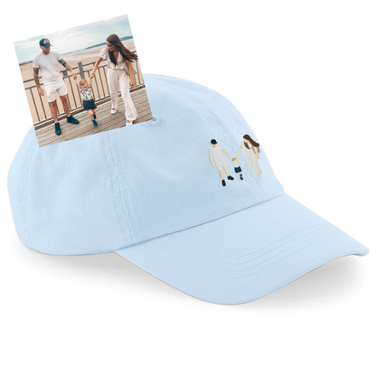 A sky blue cap with an embroidered image from an uploaded photo