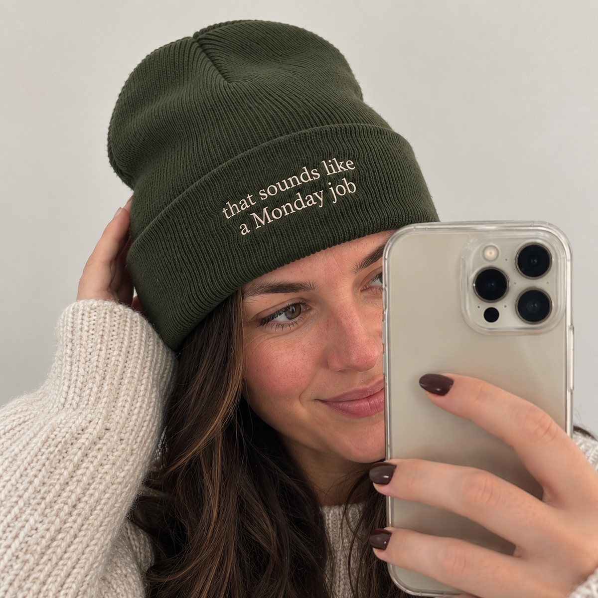 Custom text beanie with personalised cream embroidery in olive green