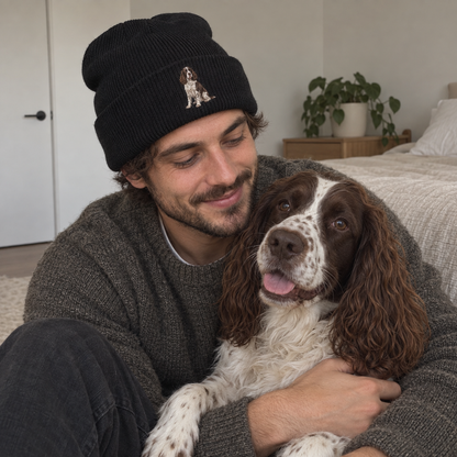 Embroidered pet portrait beanie personalised with a full-body Spaniel design, shown in a natural UGC lifestyle photo