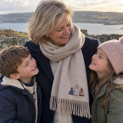Grandmother wearing a personalised embroidered photo scarf with a small muted full-colour design of one adult, a boy and a girl on a family day out