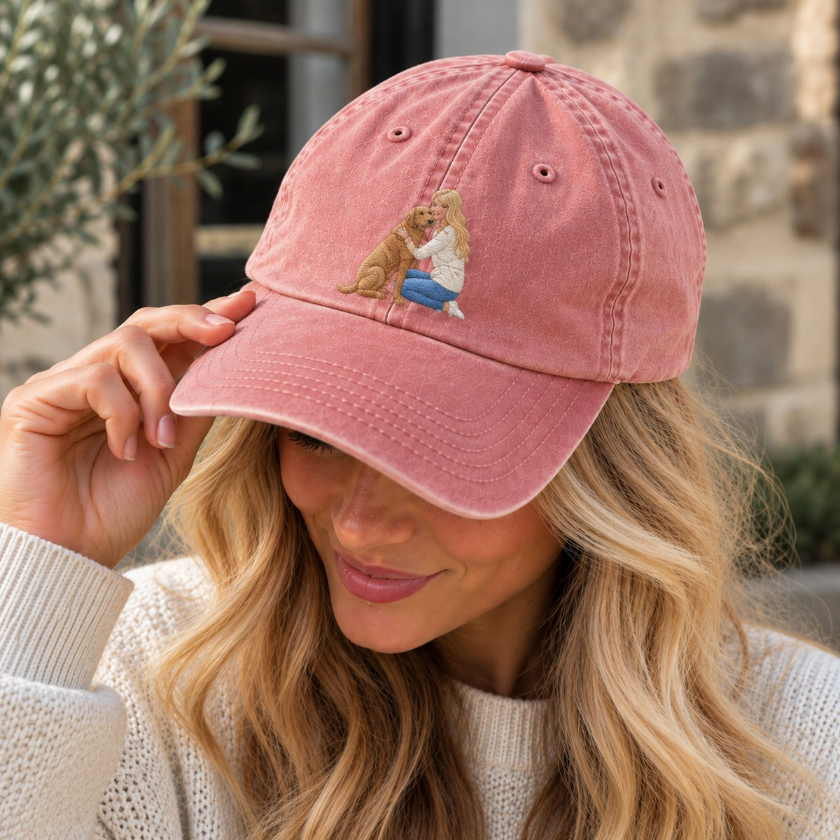 Woman wearing vintage dusky pink personalised embroidered photo cap with a small blonde woman and brown dog design
