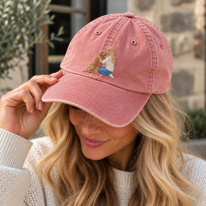 Woman wearing vintage dusky pink personalised embroidered photo cap with a small blonde woman and brown dog design