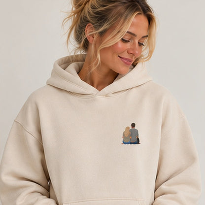 Natural stone personalised embroidered photo hoodie worn by woman, square studio photograph